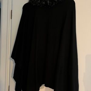 Beautiful wrap with imitation fur collar.